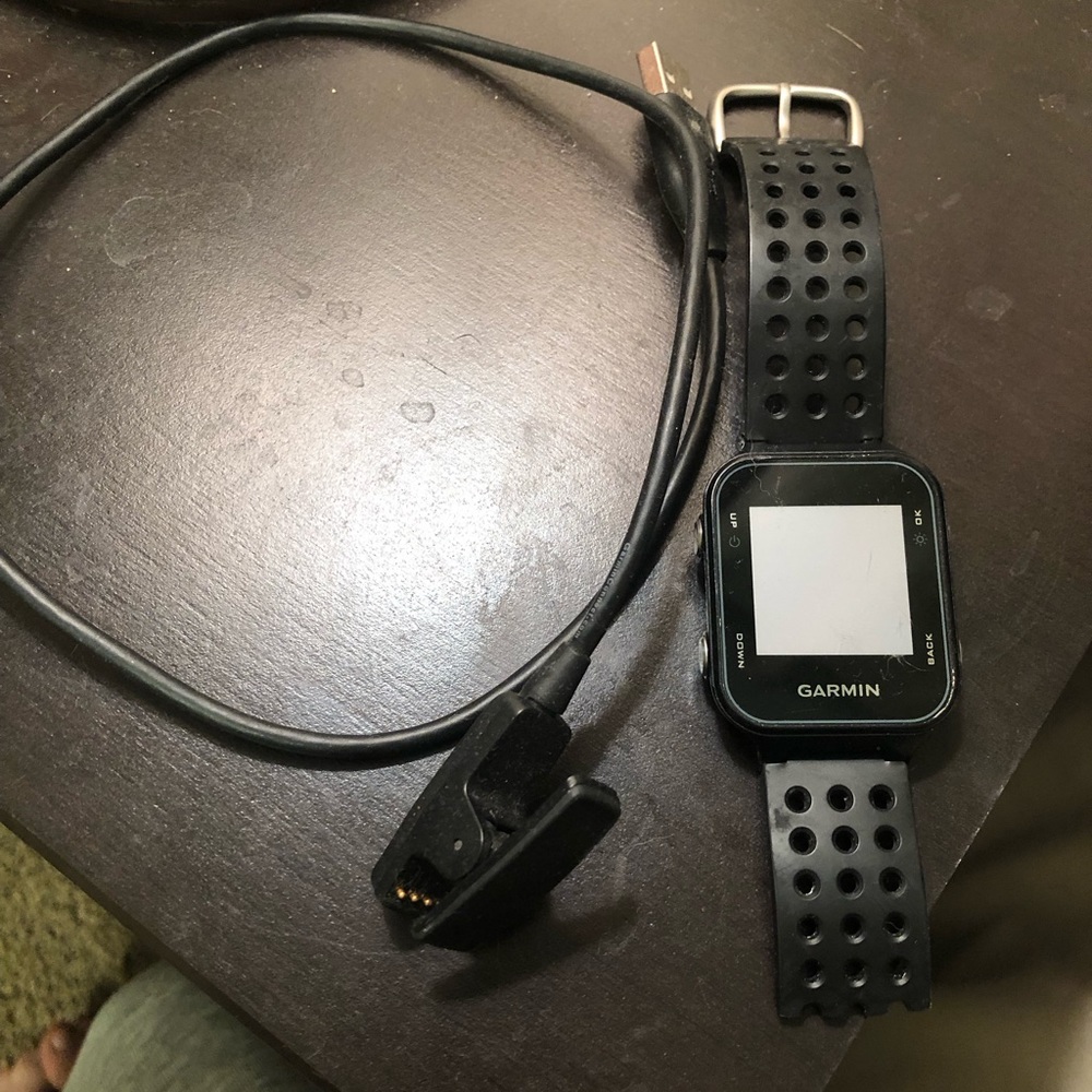 Garmin Approach S20 - used - needs new wrist strap - charger included.